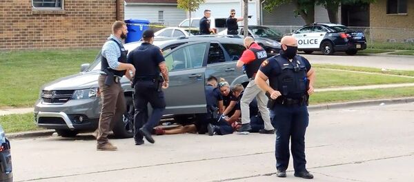 ABD'de polisin arkadan ateş ettiği siyah Jacob Blake  - Sputnik Türkiye