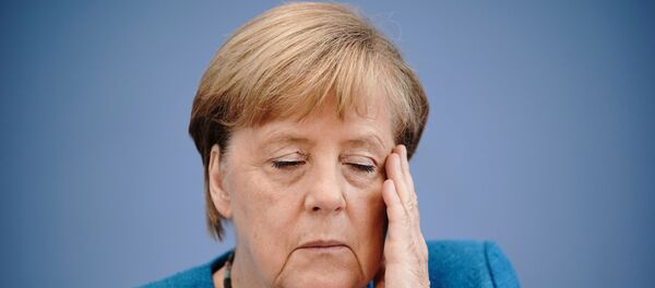 Son dönemde rahatsızlıklarıyla da gündeme gelen Almanya Başbakanı Angela Merkel, geleneksel yıllık yaz basın toplantısında soruları cevaplarken - Sputnik Türkiye