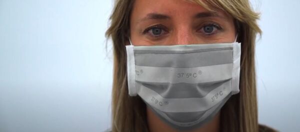 İspanyol şirketi, yüksek ateş durumunda rengi değişen maske geliştirdi - Sputnik Türkiye