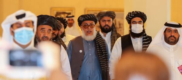 Afganistan hükümetinden temsilciler ile müzakerelere başlayan Taliban üyeleri  - Sputnik Türkiye