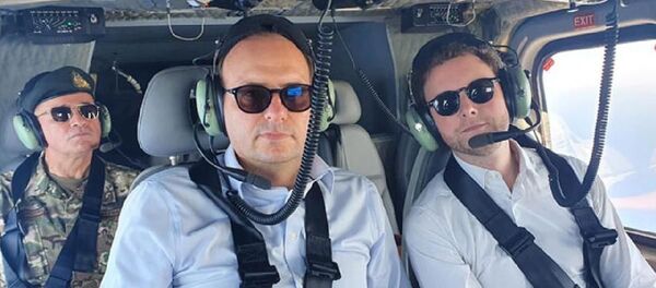 Fransa'nın Avrupa Bakanı Clement Beaune ve Güney Kıbrıslı mevkidaşı Haralambos Petridis, askeri helikopterle bölgede bulunan Yavuz Sondaj Gemisi'nin ve Kuzey Kıbrıs yönetimindeki Kapalı Maraş’ın etrafında uçuş gerçekleştirdi. - Sputnik Türkiye