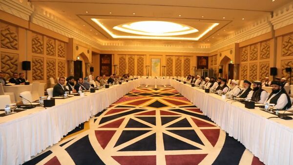 Afganistan hükümeti ve Taliban temsilcilerinin, Katar’da yürüttükleri Afganlar arası barış müzakereleri - Sputnik Türkiye