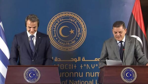Libya Ulusal Birlik Hükümeti Başbakanı Abdulhamid Dibeybe, Yunanistan Başbakanı Miçotakis ile düzenlediği ortak basın toplantısında - Sputnik Türkiye