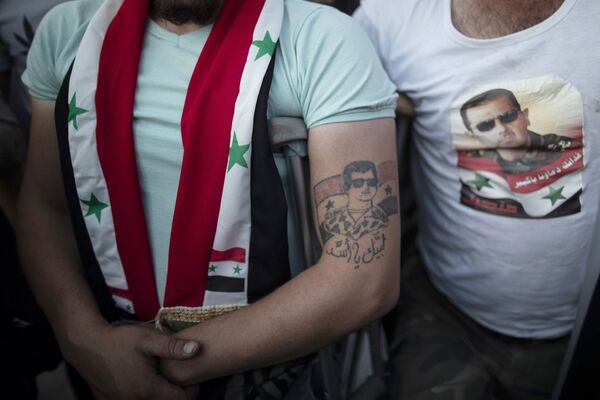 Beşar Esad’ın seçimleri kazandığı Suriye’den kareler - Sputnik Türkiye