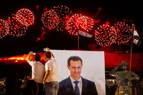 Beşar Esad’ın seçimleri kazandığı Suriye’den kareler - Sputnik Türkiye