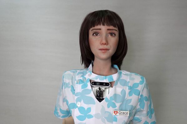 Koronavirüs vakalarının teşhisi için yapay zekadan yararlanan robot Grace, İngilizce, Mandarin dili ve Kantonca dillerini biliyor. - Sputnik Türkiye
