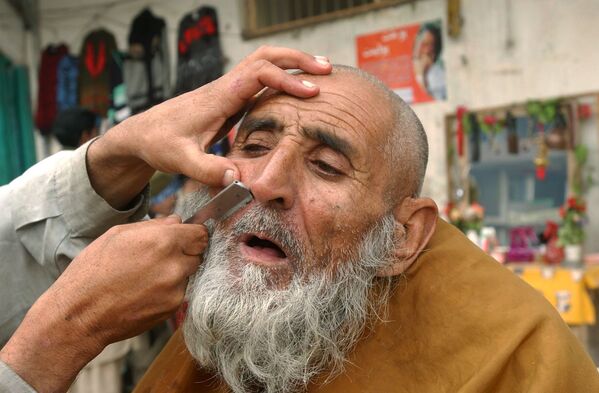 Taliban'dan sakal tıraşı yasağı - Sputnik Türkiye