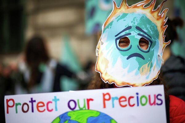 Göstericiler, Birleşmiş Milletler İklim Değişikliği Çerçeve Sözleşmesi 26. Taraflar Konferansı'nda (COP26) çevre için daha etkili kararlar alınmasını istedi. - Sputnik Türkiye