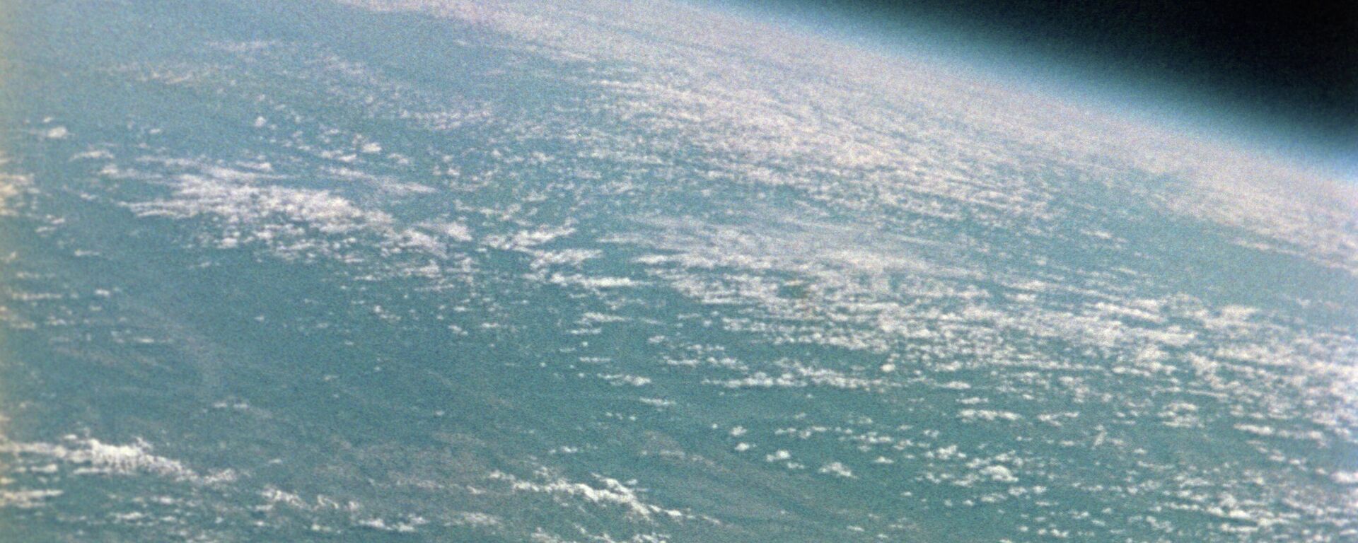 Soviyet kozmonot German Titov'un uzaydan çektiği Dünya görüntüsü. - Sputnik Türkiye, 1920, 31.12.2021