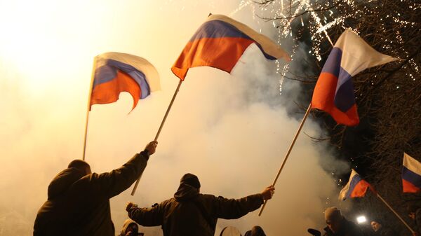 Donetsk ve Lugansk Halk Cumhuriyetlerinin bağımsızlığının tanınması için yapılan kutlamaları - Sputnik Türkiye