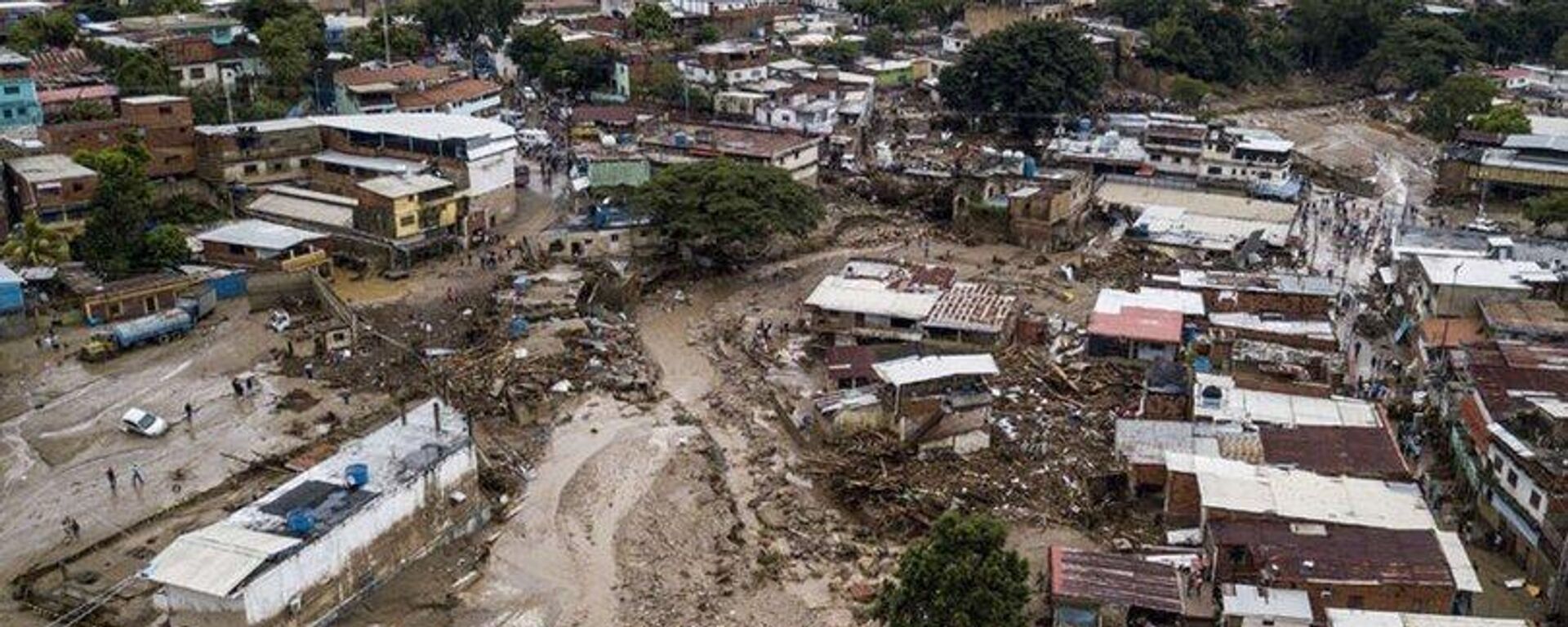 Venezüella’da yoğun yağışların ardından meydana gelen toprak kayması sonucu 22 kişinin hayatını kaybettiği, 50'den fazla kişinin ise kayıp olduğu bildirildi. - Sputnik Türkiye, 1920, 10.10.2022