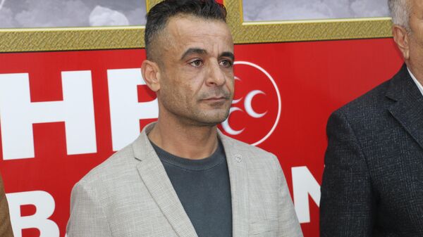 MHP Güçlükonak İlçe Başkanı Mehmet Emin İlhan  - Sputnik Türkiye