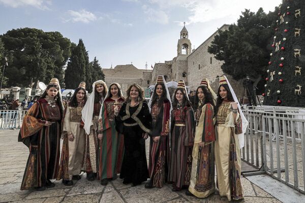 Dünyanın dört bir yanından Hristiyanlar, her yıl aralık ayı sonlarında Noel dolayısıyla işgal altındaki Batı Şeria&#x27;nın Beytüllahim kentine gelerek hac ziyaretinde bulunuyor. - Sputnik Türkiye