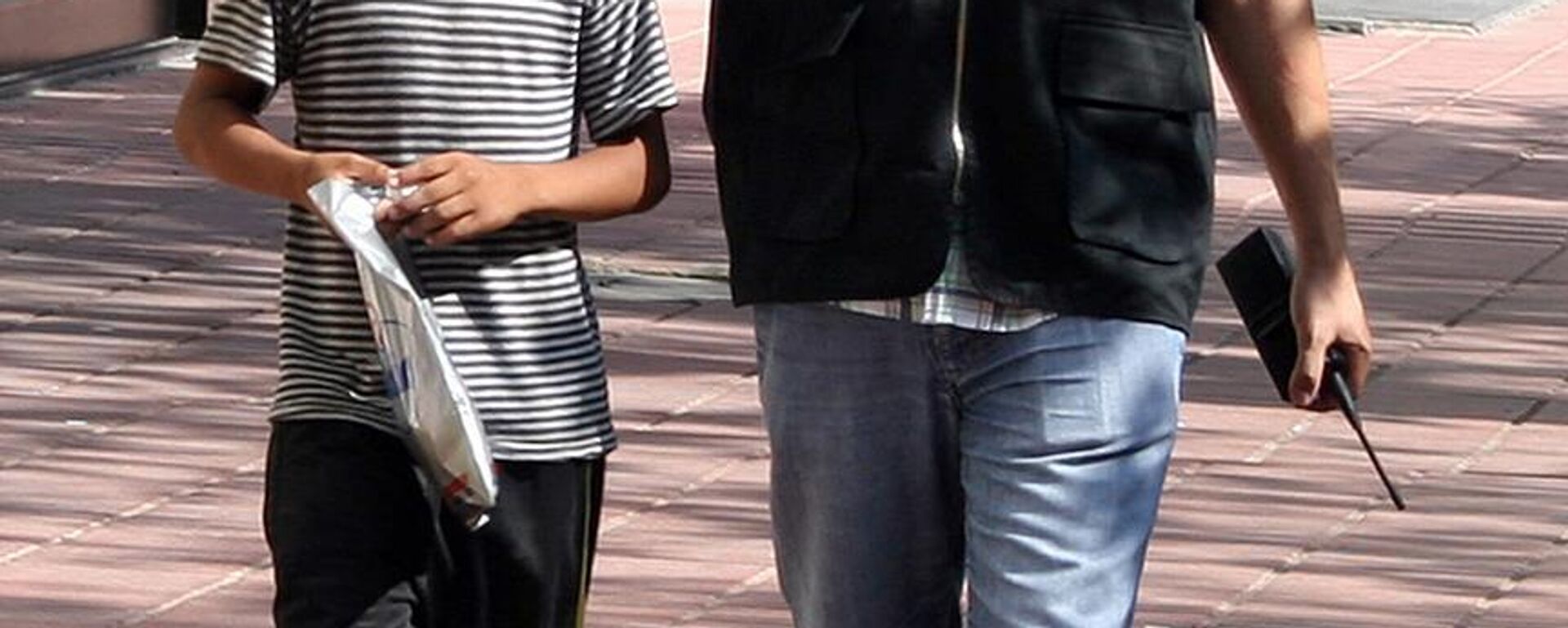 Suça sürüklenen çocuk - Sputnik Türkiye, 1920, 04.10.2025