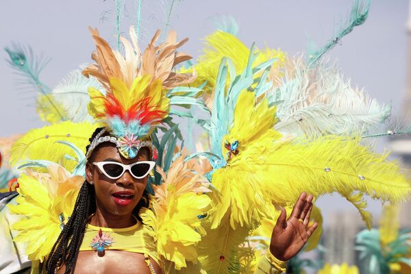 Kuzey Amerika&#x27;nın en büyük kültür festivali olan Toronto Karayip Karnavalı, cumartesi günü düzenlenen Büyük Geçit Töreni ile devam etti. - Sputnik Türkiye