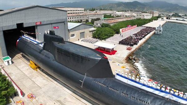 Kuzey Kore, ilk operasyonel taktik nükleer saldırı denizaltısını Kim Jong-Un'un katıldığı törenle denize indirdi. - Sputnik Türkiye