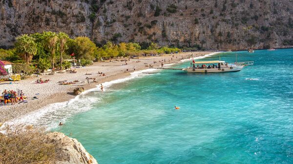 Fethiye Belediyesi, 'Best  places for a beach holiday in October' başlığıyla 'Ekim ayında plaj  tatili için en iyi yerler' listesini açıklayan The Times gazetesinin  Türkiye'den sadece Fethiye'yi seçtiğini açıkladı. - Sputnik Türkiye