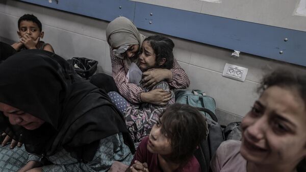 Gazze'deki Sağlık Bakanlığı Sözcüsü: İsrail'in Gazze'deki El-Ehli Baptist Hastanesi'ni bombalaması sonucu ölü sayısı 500'e yükseldi. Saldırı sonucu çok sayıda yarılı, Gazze kentindeki Şifa hastanesine kaldırıldı.  - Sputnik Türkiye