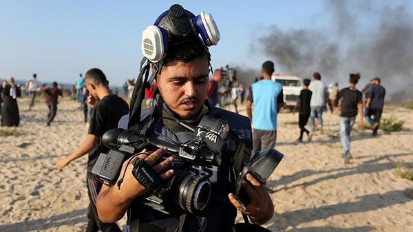 AA'nın Gazze'de görev yapan kameramanı Muntasır es-Savvaf, İsrail hava saldırısında hayatını kaybetti.
 - Sputnik Türkiye