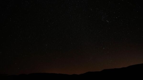 Ankara'nın Kızılcahamam ilçesinde bulunan Işık Dağı ve Karagöl Jeosit Alanı çevresinde, yıldızlar görsel şölen oluşturdu.  - Sputnik Türkiye