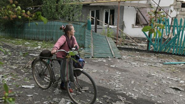 Дом в Кировском районе Донецка, разрушенный в результате обстрела со стороны ВСУ - Sputnik Türkiye