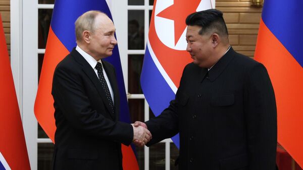 Rusya Devlet Başkanı Vladimir Putin ve Kuzey Kore lideri Kim Jong-Un - Sputnik Türkiye