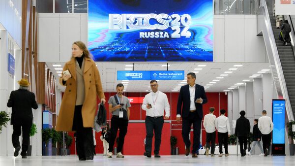 Visitors attend the 16th BRICS Summit in Kazan, Russia. - Sputnik Türkiye