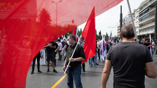 Yunanistan Komünist Partisi üyelerinin başkent Atina'da düzenlediği gösteri - Sputnik Türkiye