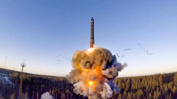 In this file photo taken from a video distributed by Russian Defense Ministry Press Service, on Wednesday, Dec. 9, 2020, a rocket launches from missile system as part of a ground-based intercontinental ballistic missile test launched from the Plesetsk facility in northwestern Russia - Sputnik Türkiye