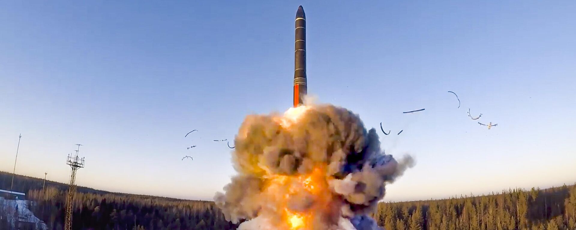 In this file photo taken from a video distributed by Russian Defense Ministry Press Service, on Wednesday, Dec. 9, 2020, a rocket launches from missile system as part of a ground-based intercontinental ballistic missile test launched from the Plesetsk facility in northwestern Russia - Sputnik Türkiye, 1920, 22.11.2024