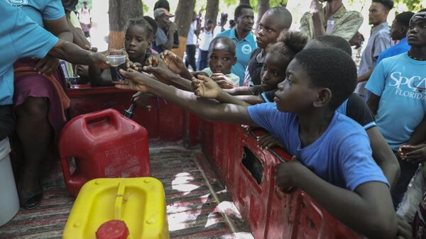 UNICEF: Haiti'de çocuklar silahlı çetelerin ellerine düşüyor, çete üyelerinin neredeyse yarısı çocuk - Sputnik Türkiye