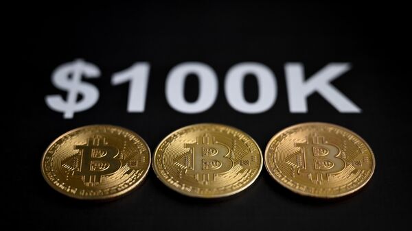 Bitcoin'de rekor: 100 bin doları aştı
 - Sputnik Türkiye