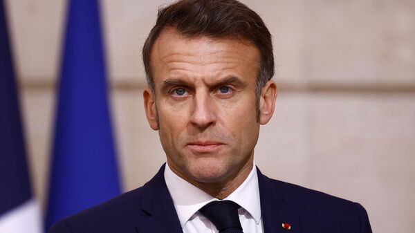 French President Emmanuel Macron delivers a statement as part of Nigerian President Bola Tinubu's two-day state visit to France, Thursday, Nov. 28, 2024 at the Elysee Palace in Paris. (Sarah Meyssonnier/Pool via AP) - Sputnik Türkiye