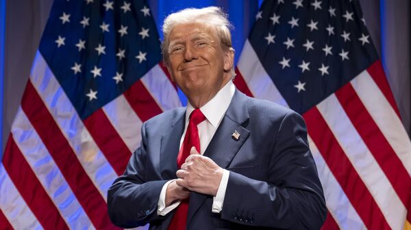 President-elect Donald Trump arrives to speak at a meeting of the House GOP conference, Wednesday, Nov. 13, 2024, in Washington.  - Sputnik Türkiye