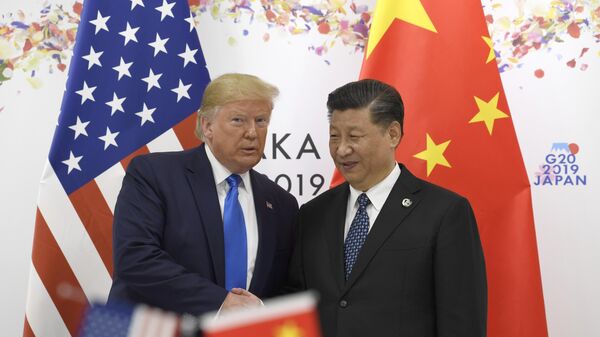 President Donald Trump poses for a photo with Chinese President Xi Jinping during a meeting on the sidelines of the G-20 summit in Osaka, Japan, Saturday, June 29, 2019. (AP Photo/Susan Walsh) - Sputnik Türkiye