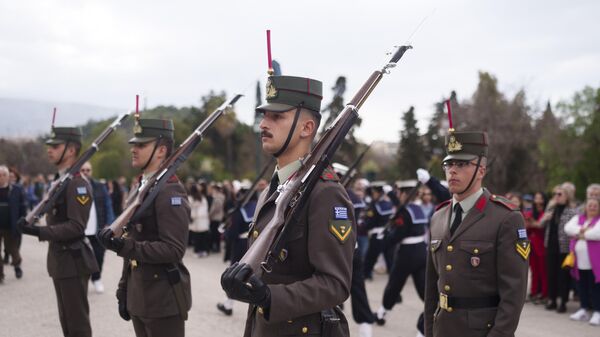 Soldiers prepare for a military parade commemorating Greek Independence Day in Athens, on Monday, March 25, 2024. The national holiday on March 25 marks the start of Greece's 1821 war of independence against the 400-year Ottoman rule. (AP Photo/Petros Giannakouris) - Sputnik Türkiye