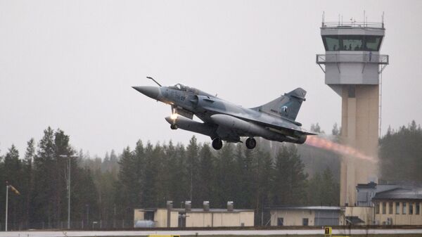 A French Mirage 2000 jet fighter takes off during the Arctic Challenge Exercise (ACE 2015) organized by Sweden, Finland and Norway in Rovaniemi, Finland on May 27, 2015.  - Sputnik Türkiye