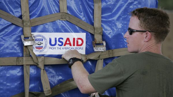 A U.S. marine packages USAID supplies bound for cyclone devastated Myanmar at the Utapao Air Force base near the southern city of Rayong, Thailand, Wednesday, May 14, 2008 - Sputnik Türkiye