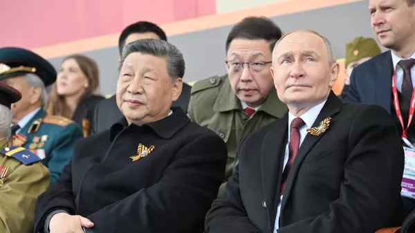 Президент РФ В. Путин и иностранные лидеры на военном параде в честь 80-летия Победы - Sputnik Türkiye