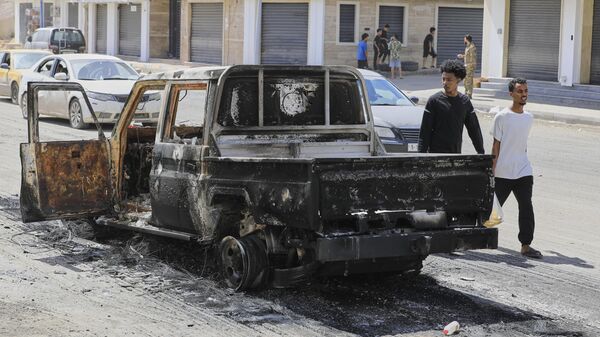 Libya'nın başkenti Trablus'ta silahlı çatışmalar yaşandı - Sputnik Türkiye