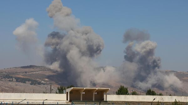 İsrail savaş uçakları Lübnan'ın güneyindeki Nabatiye kırsalına yoğun hava saldırısı düzenledi - Sputnik Türkiye