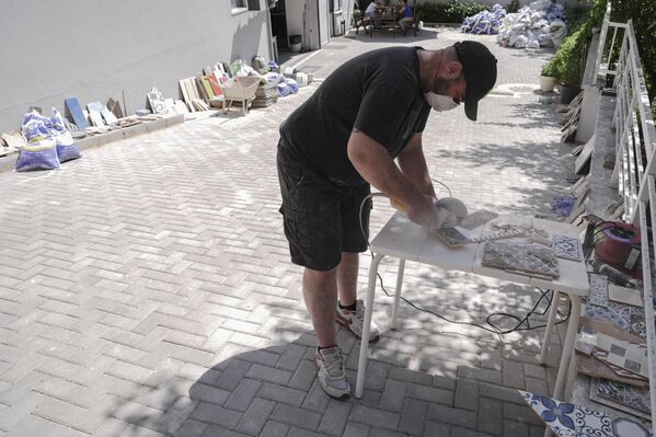 Ememem kendini “kaldırım cerrahı” ve “çukur şövalyesi” olarak tanımlıyor. - Sputnik Türkiye