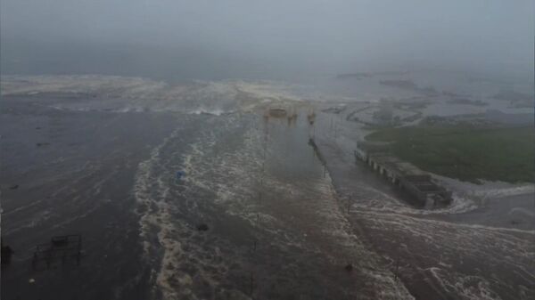 Rusya Acil Durumlar Bakanlığı, Kamçatka'daki depremin ardından meydana gelen tsunami nedeniyle Severo-Kurilsk şehrinin bir kısmının sular altında kaldığını bildirdi - Sputnik Türkiye