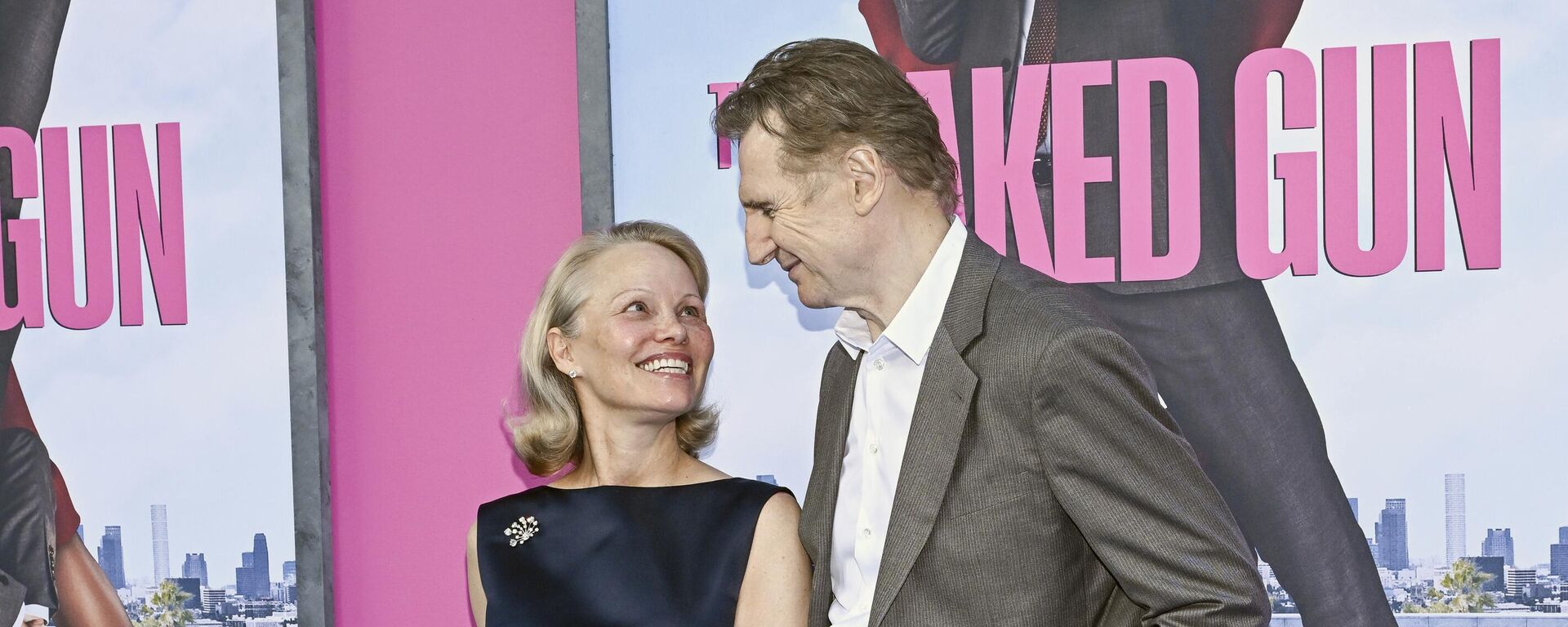 Pamela Anderson, Liam Neeson - Sputnik Türkiye, 1920, 01.08.2025