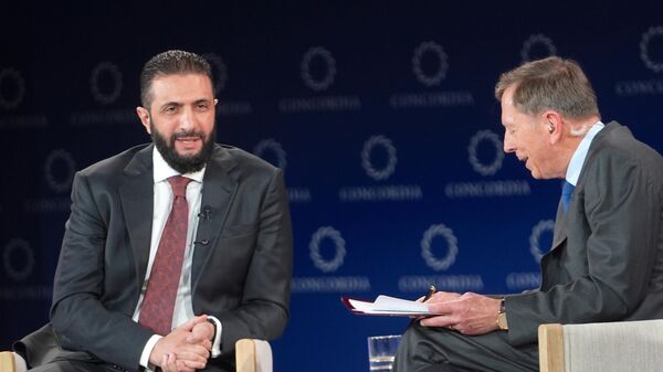 Ahmed Şara ve david petraeus - Sputnik Türkiye