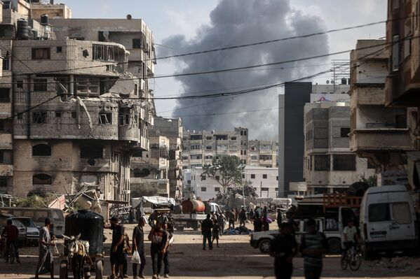 Saldırılara rağmen yüzbinlerce Filistinli Gazze kentinde kalmaya devam ediyor. - Sputnik Türkiye
