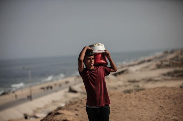 Gazze&#x27;deki Sağlık Bakanlığı, yaptığı yazılı açıklamada, İsrail&#x27;in devam eden saldırılarında yaşanan can kayıpları ve yaralanmalara ilişkin son verileri paylaştı.  Son 24 saatte Gazze Şeridi&#x27;ndeki hastanelere 66 ölü ve 265 yaralının ulaştığı belirtildi. - Sputnik Türkiye