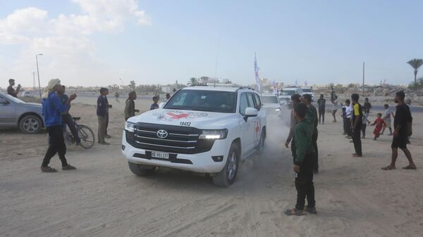 Hamas İsrailli 4 rehinenin cenazelerini teslim etti - Sputnik Türkiye