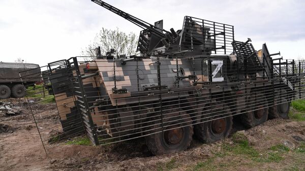 BTR 4E armored personnel carrier left by the Ukrainian Armed Forces in Kupyansk. - Sputnik Türkiye