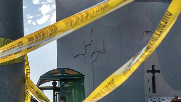 Crime scene tape is stretched across the exterior of the Geneva Presbyterian Church in Laguna Woods, Calif., Sunday, May 15, 2022, after a fatal shooting. - Sputnik Türkiye